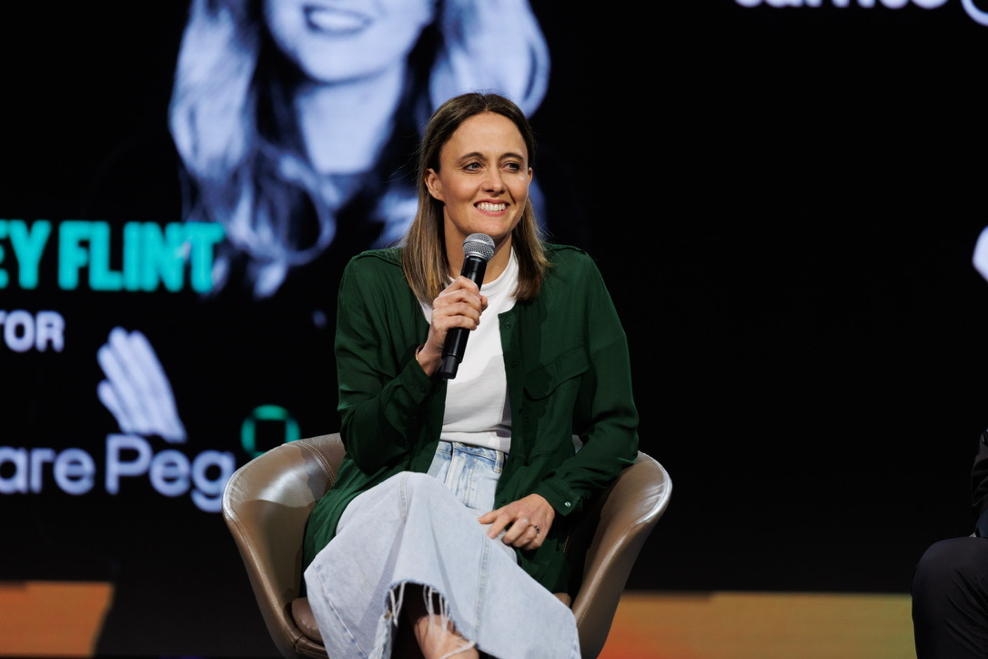 Jessica Dove London speaking on stage